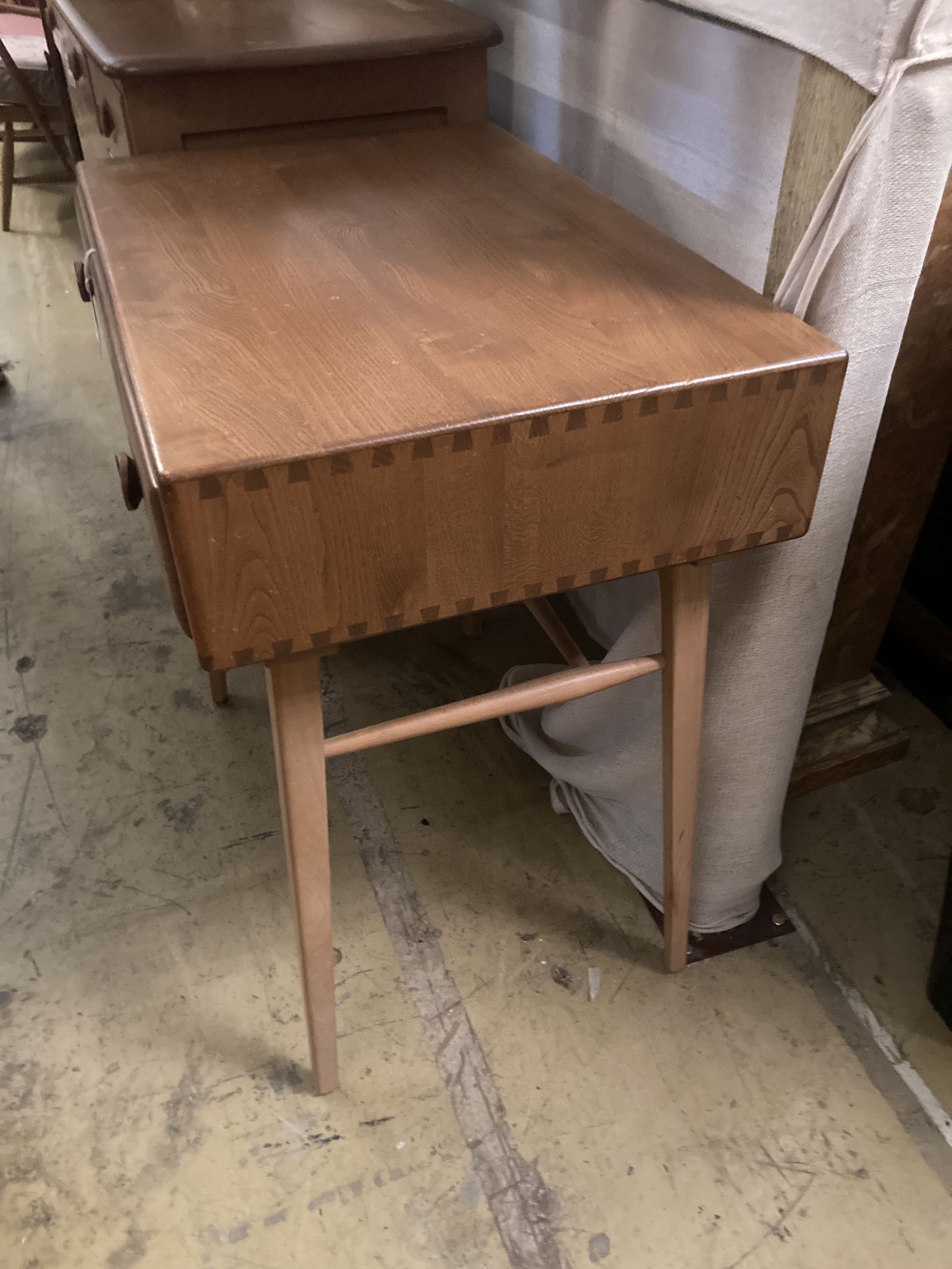An Ercol elm side table fitted single frieze drawer, width 68cm depth 48cm height 75cm